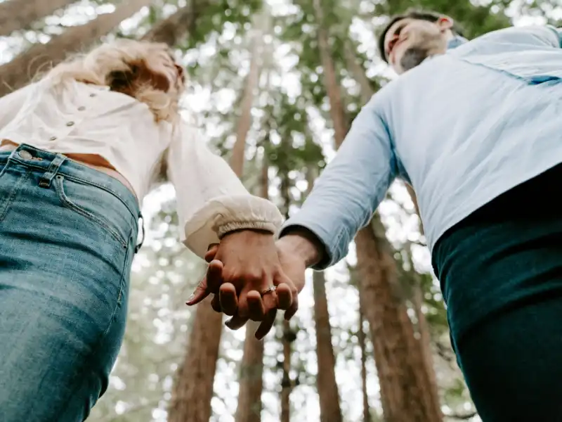 Couple holding hands